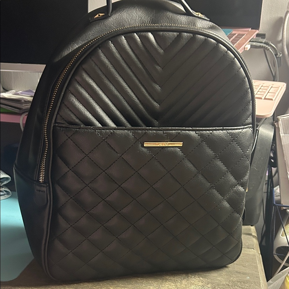 ALDO Black Quilted Faux Leather Backpack with Gold Accent